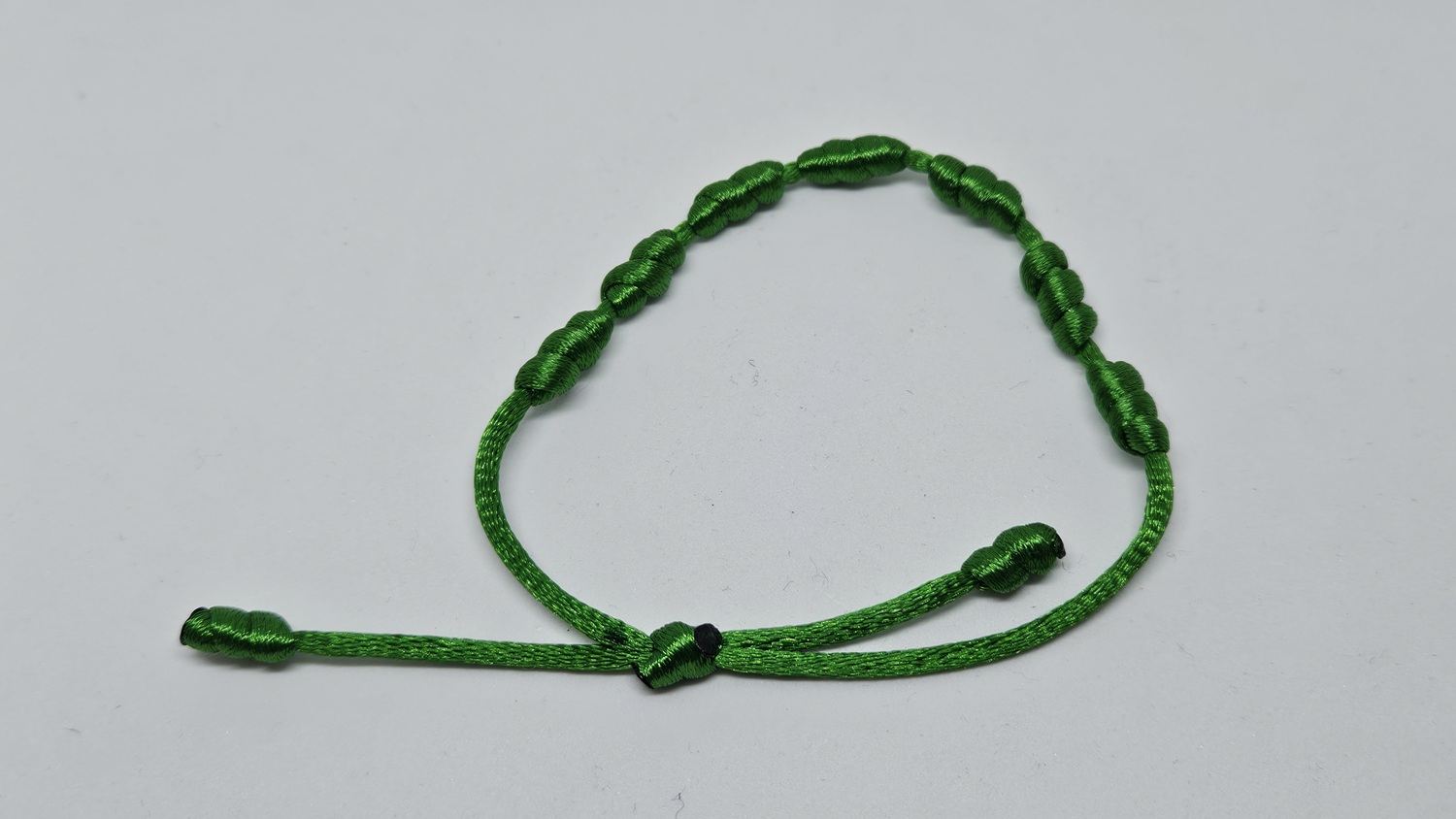 7-Knoten Schutzarmband Bild 2