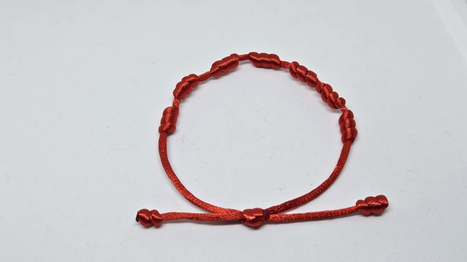 7-Knoten Schutzarmband Bild 3
